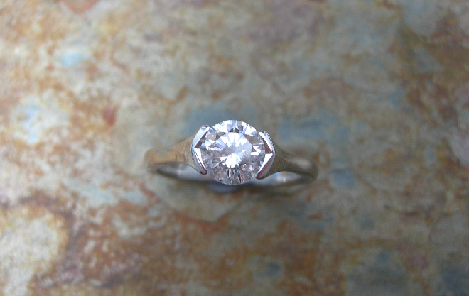 An 18ct white gold mounted diamond single-stone ring,