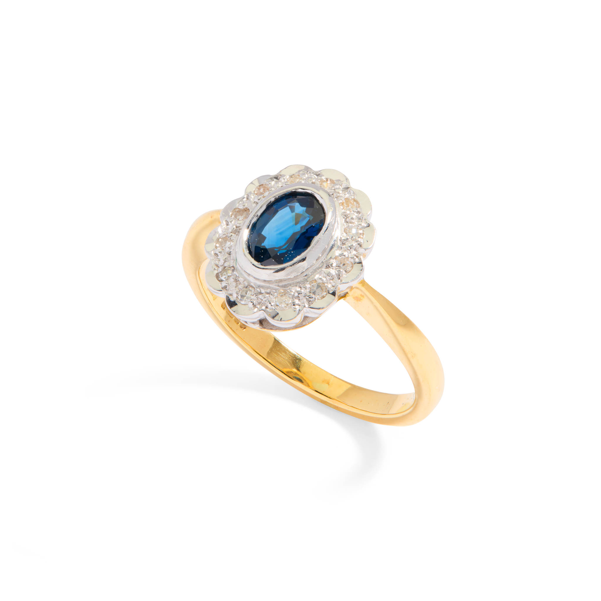 An 18ct gold sapphire and diamond ring