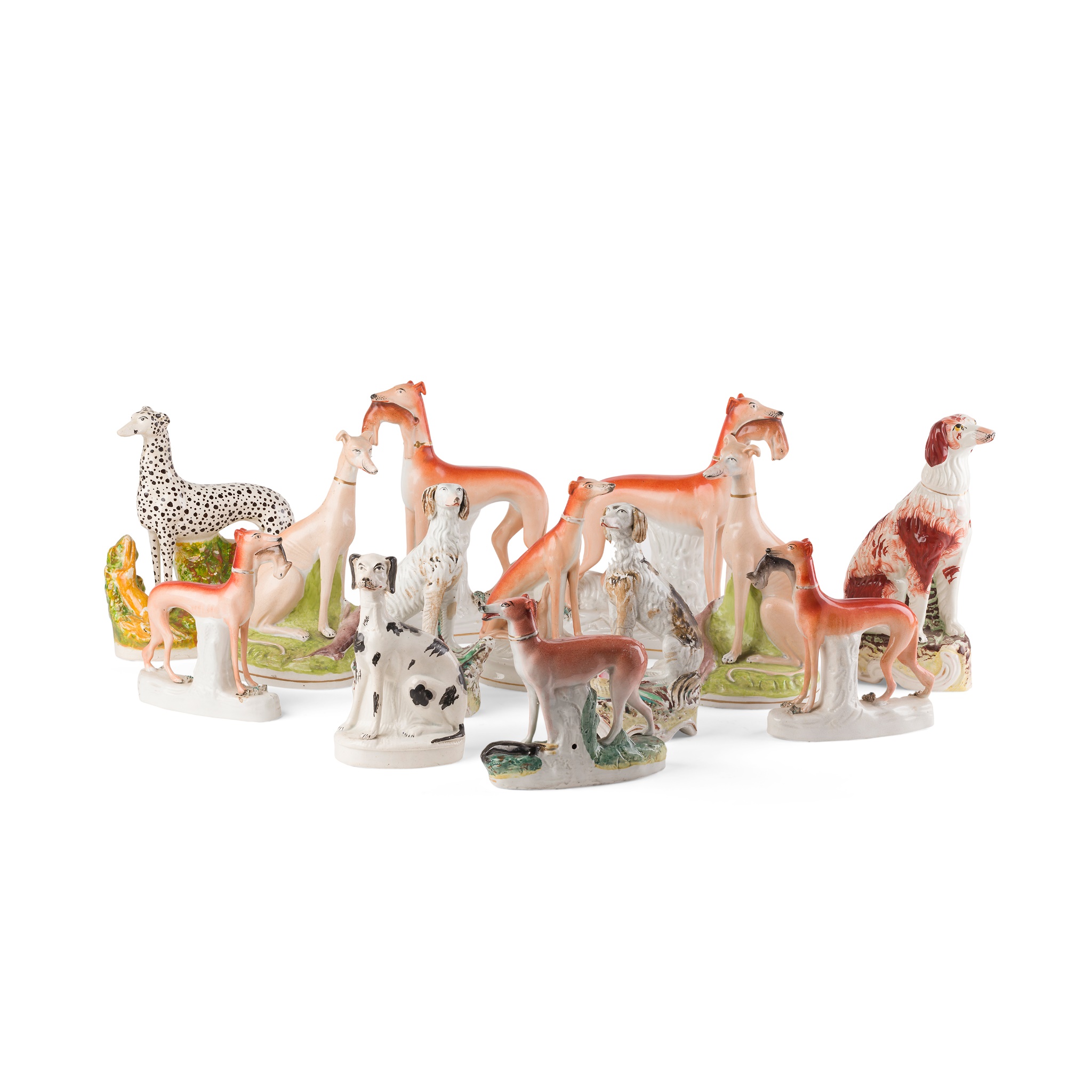 GROUP OF STAFFORDSHIRE POTTERY FIGURES OF DOGS