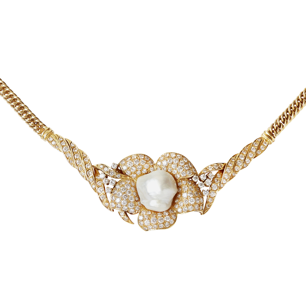 A contemporary pearl and diamond set pendant