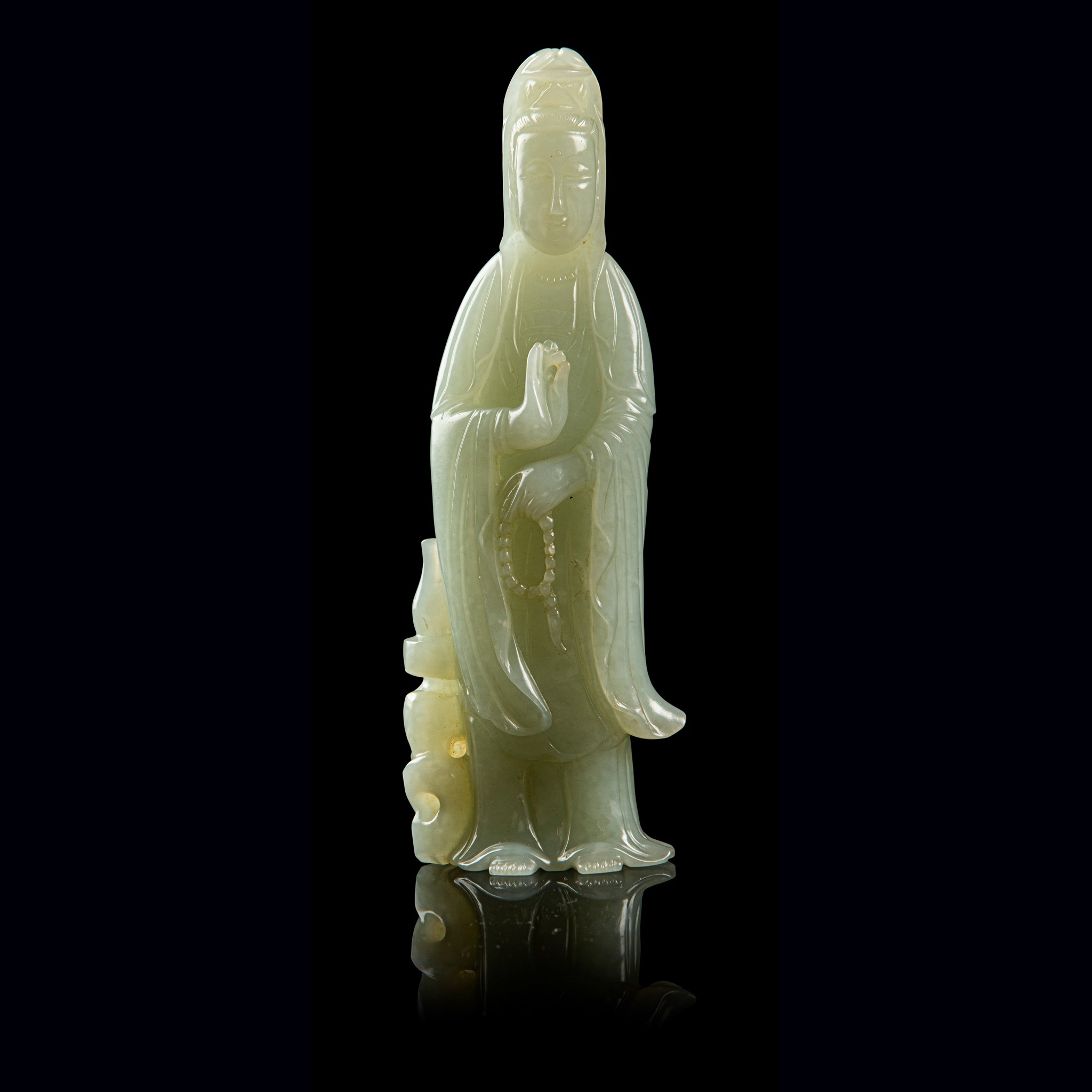 PALE CELADON JADE CARVING OF GUANYIN