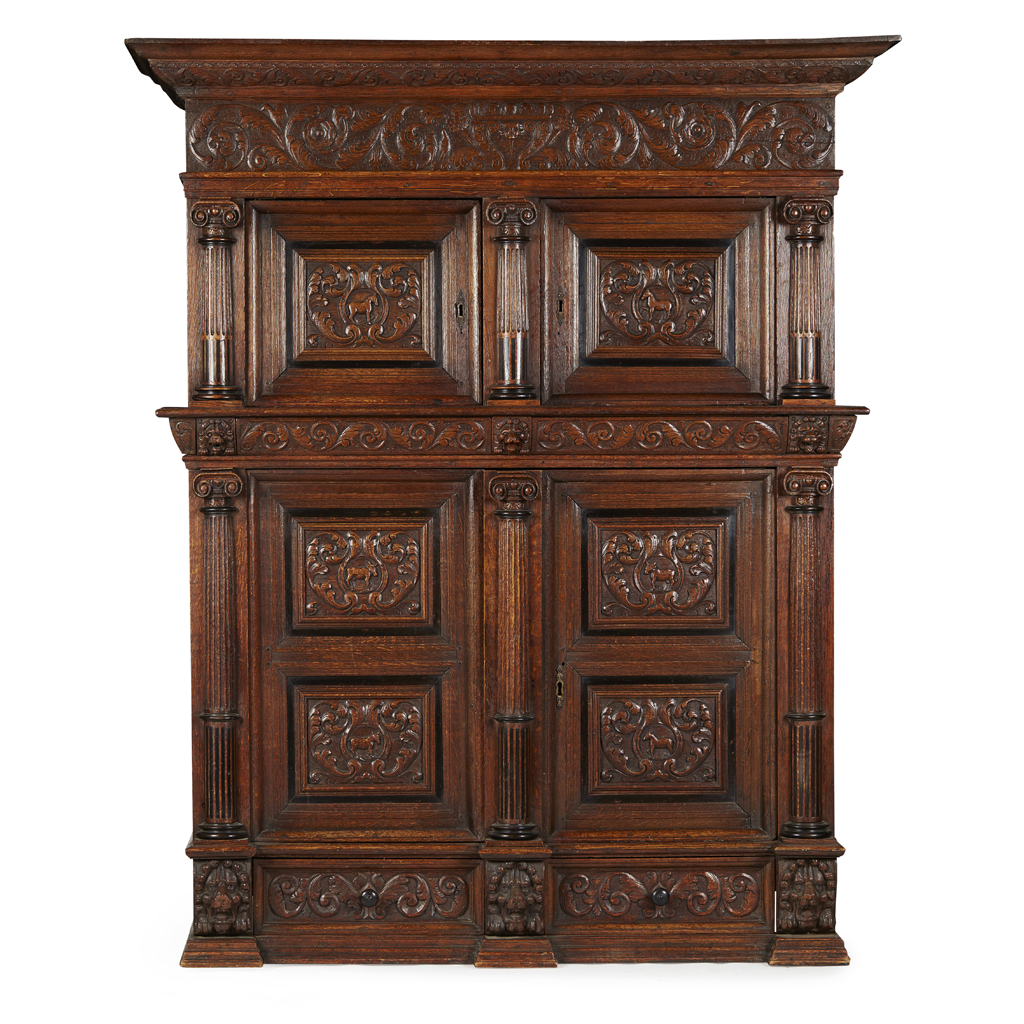 FLEMISH CARVED OAK AND EBONY ARMOIRE A DEUX CORPS