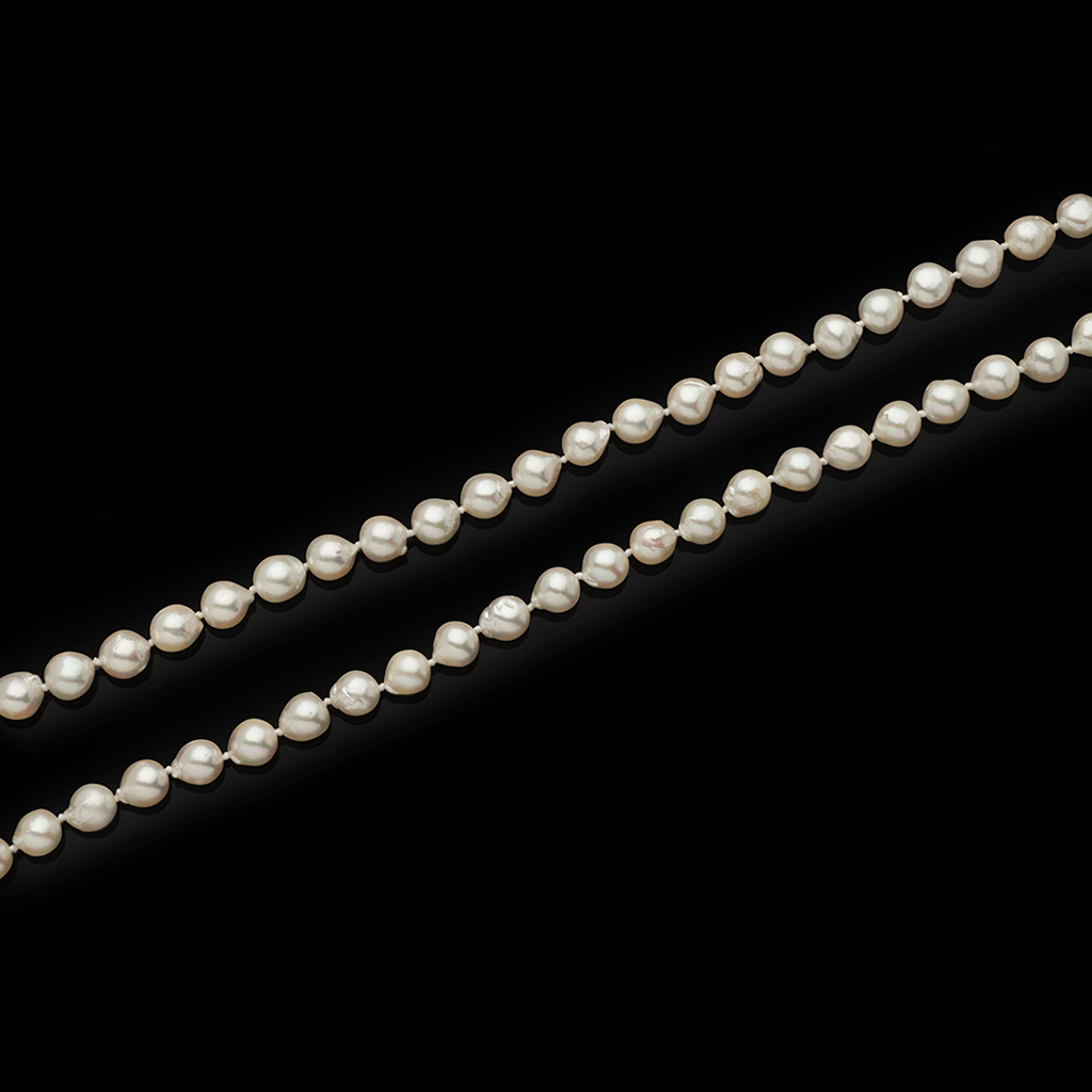 An opera length cultured pearl necklace, retailed by Bentley & Skinner