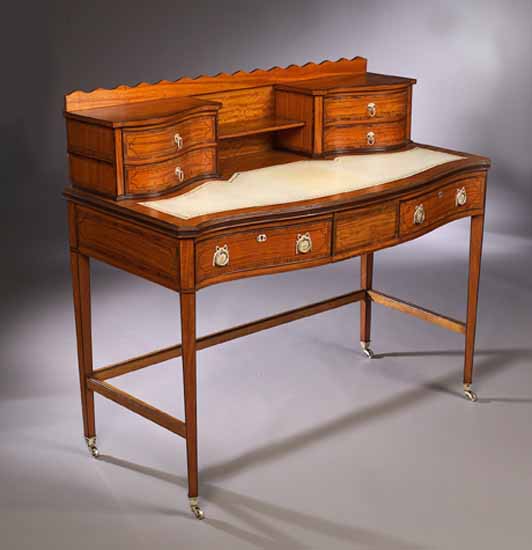 An Edwardian satinwood writing desk