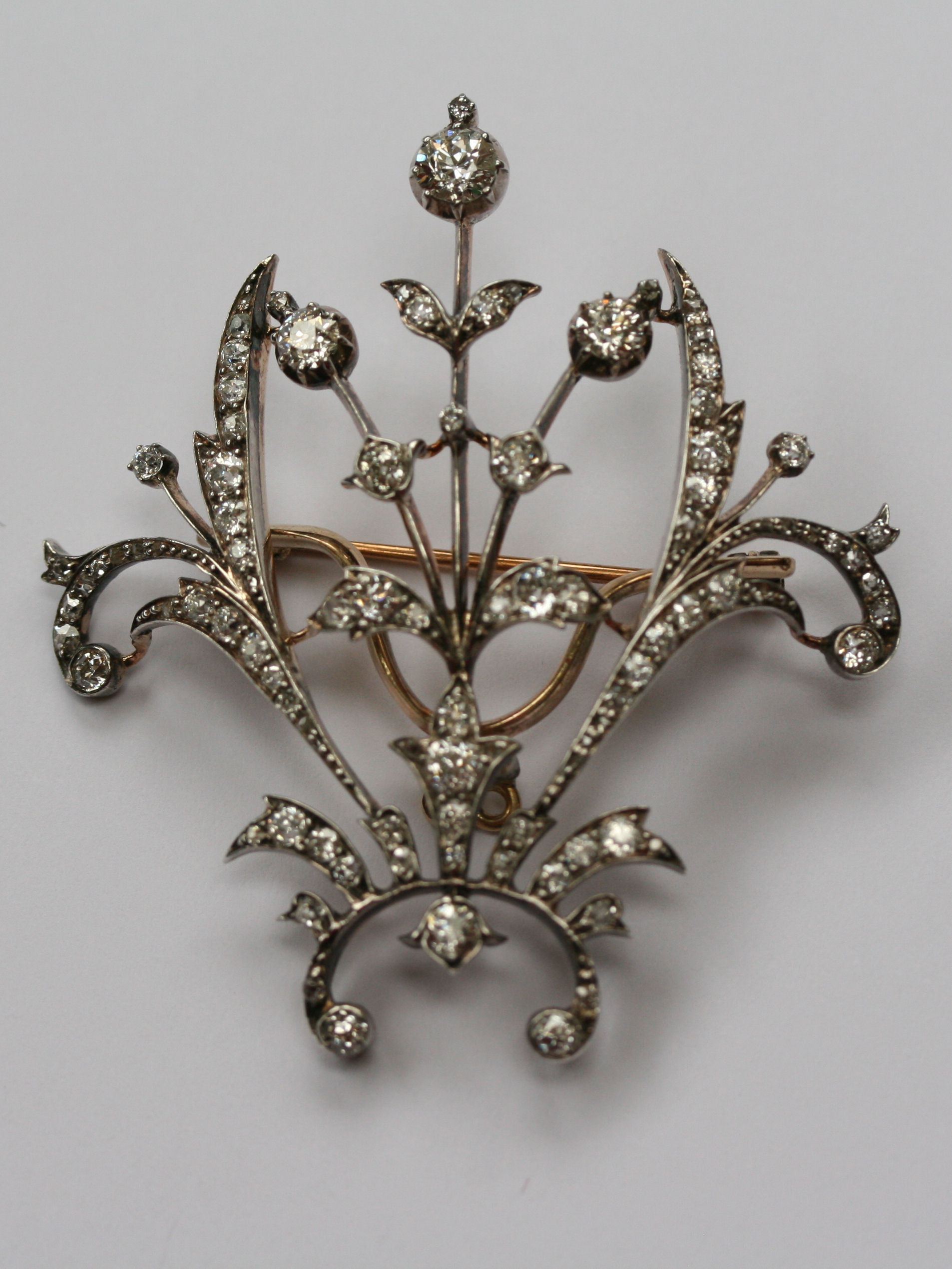 An early 20th century diamond set spray form brooch