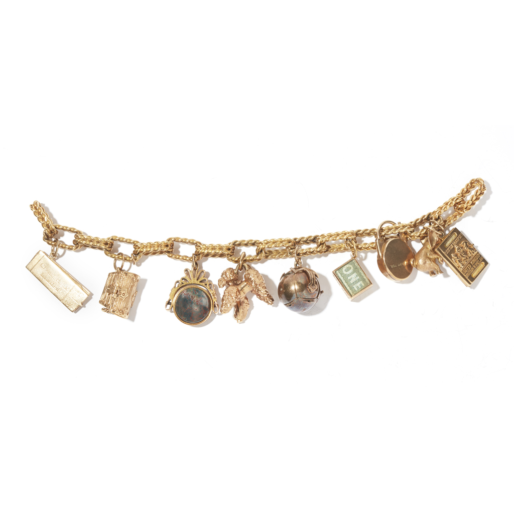 A 18ct charm bracelet