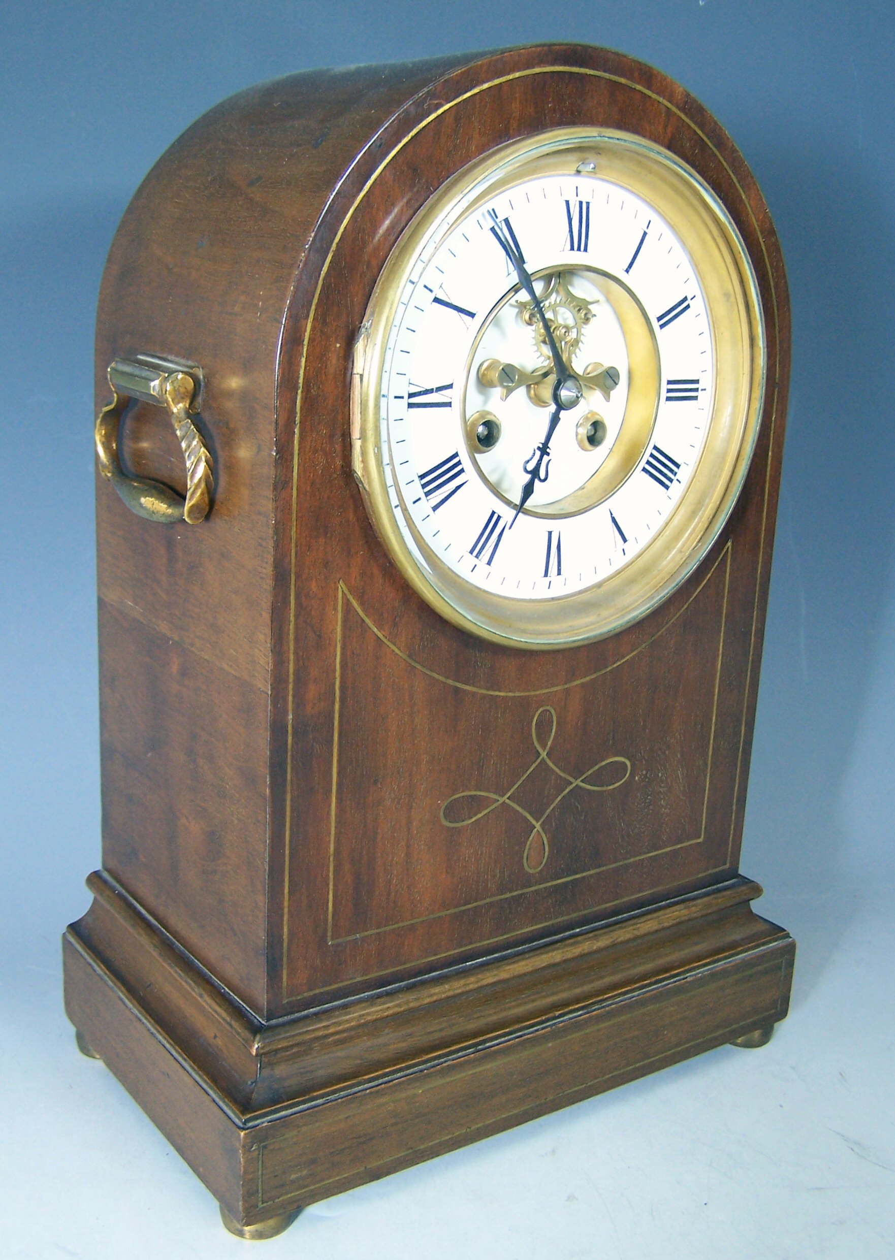 An Edwardian mahogany cased mantel clock,
