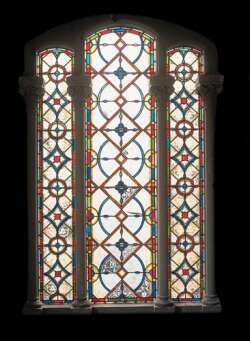 A pair of mid 19th century stained glass windows