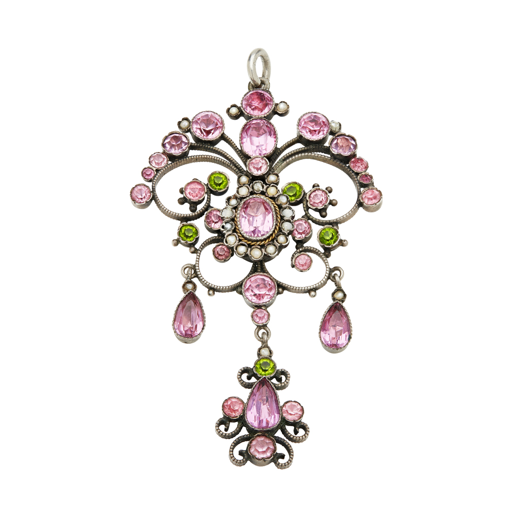 An early 20th century pink and green paste set brooch