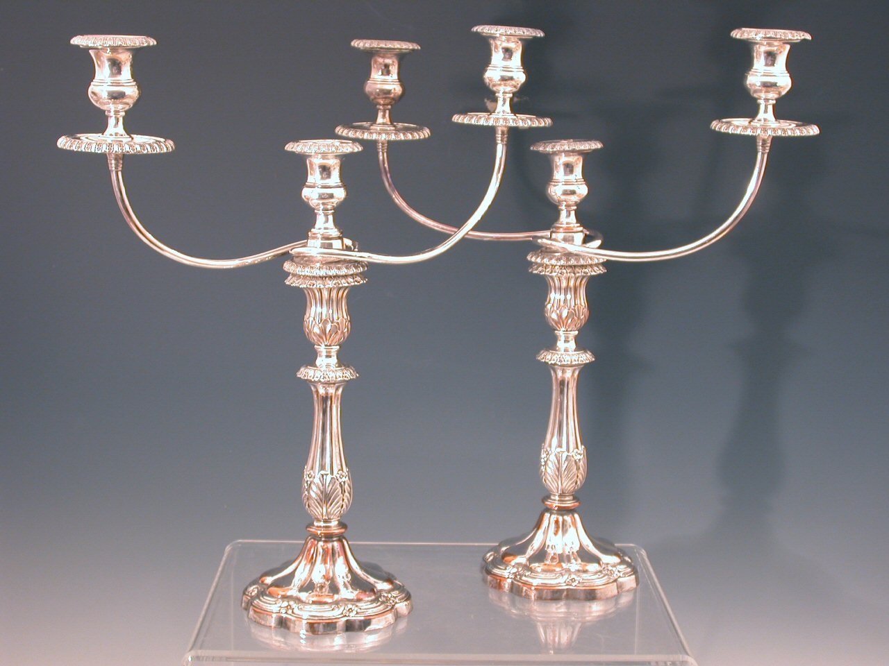A pair of Sheffield plated table candlesticks
