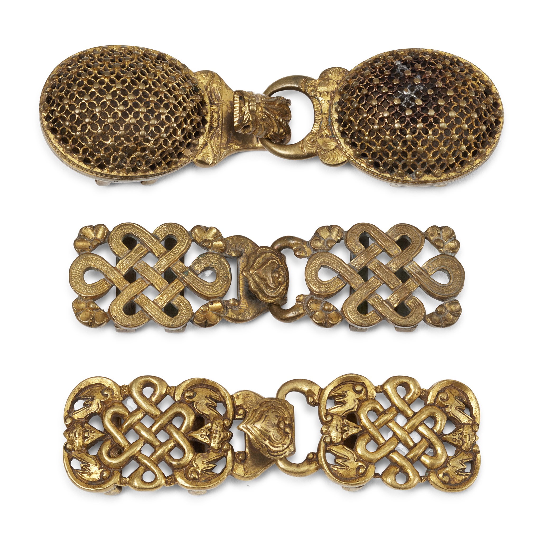 GROUP OF THREE GILT-BRONZE BELT BUCKLES