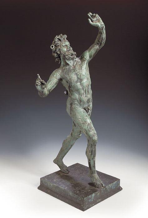 A green patinated bronze figure of a Bacchic faun