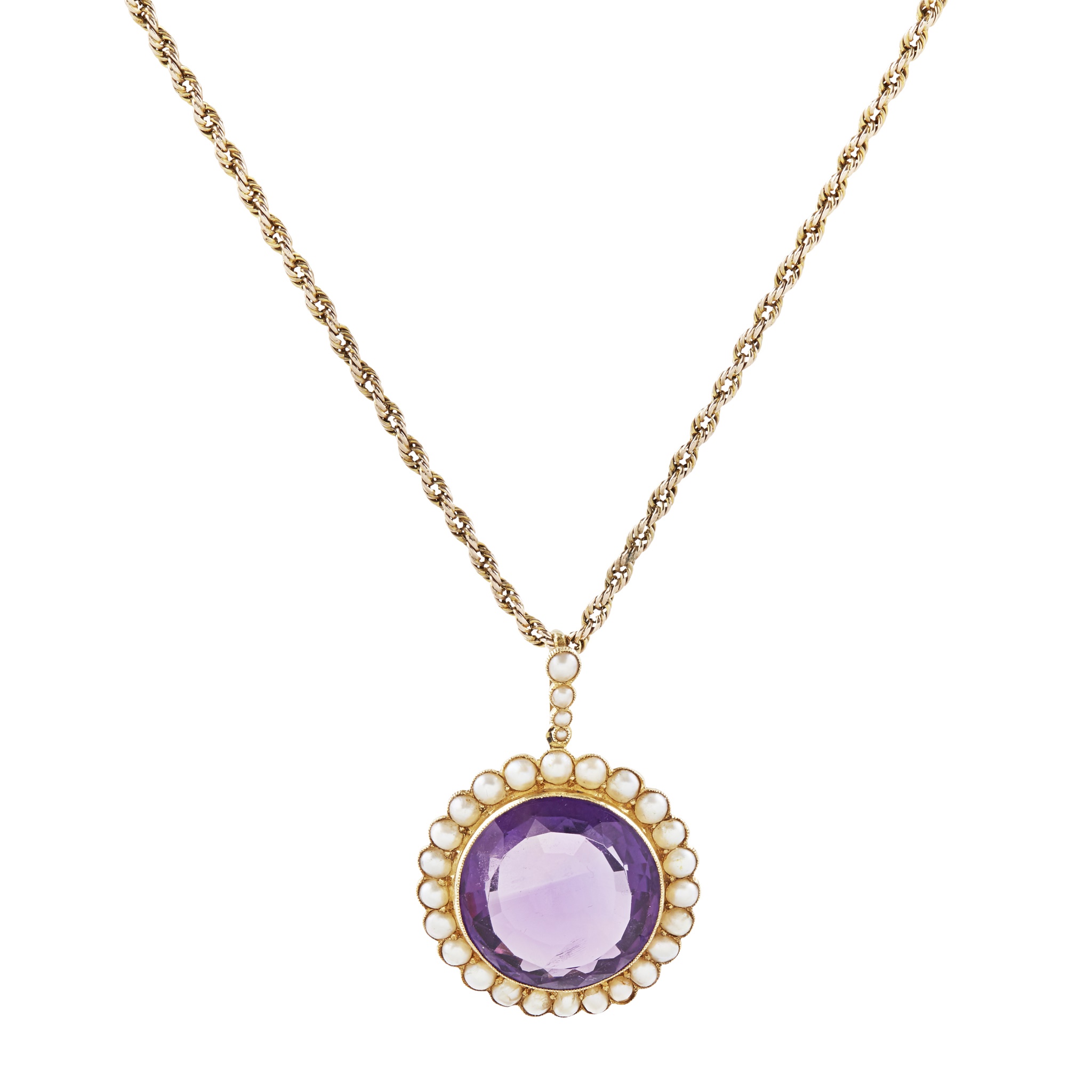 An early 20th century amethyst and pearl set pendant