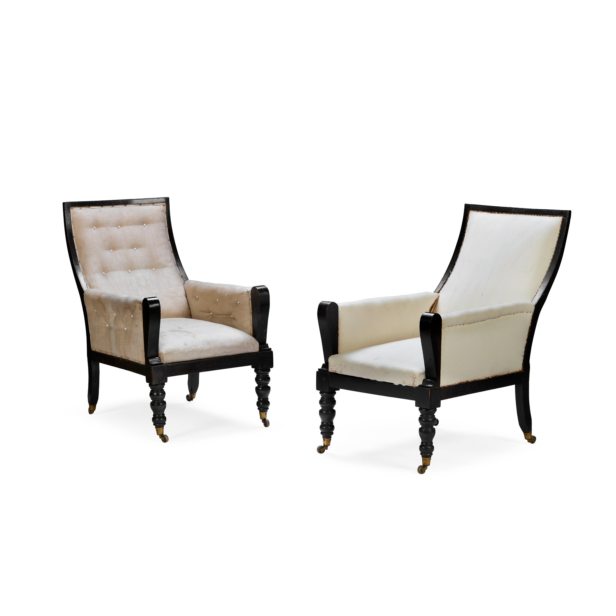 PAIR OF ANGLO-COLONIAL GEORGE IV EBONISED LIBRARY ARMCHAIRS
