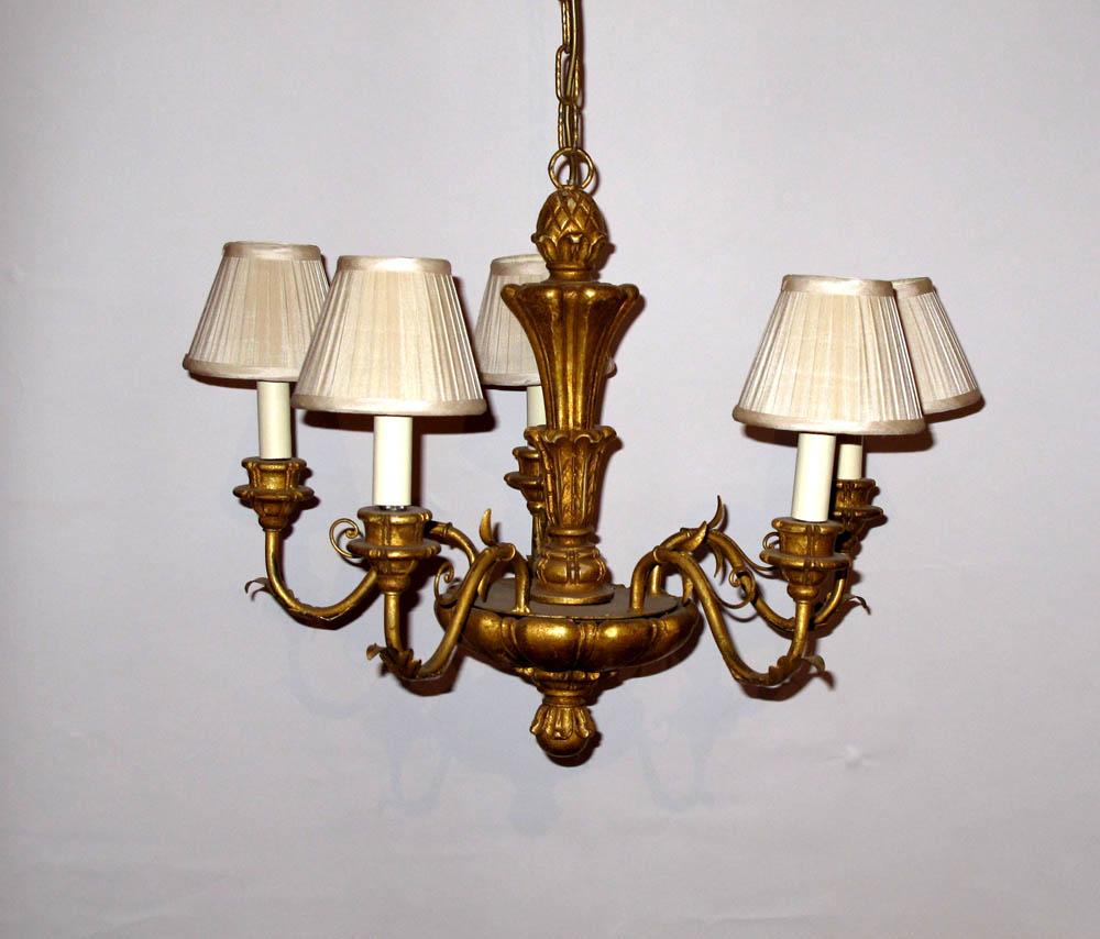 A pair of giltwood five-branch chandeliers