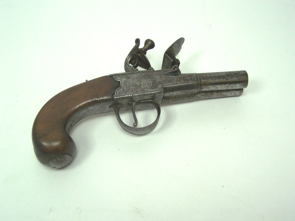 A late 18th century flintlock boxlock turn-off side-by-side double barrelled pocket pistol