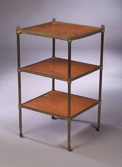 A 19th century birds eye maple three tier etagere