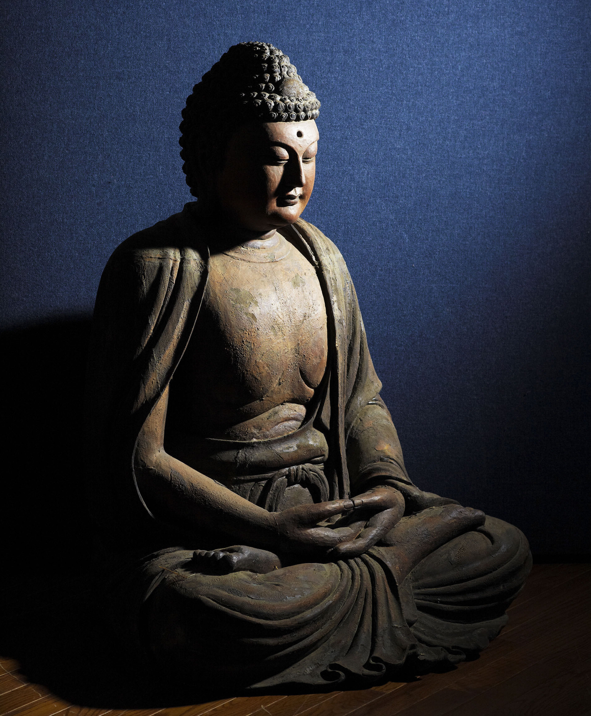 LARGE SEATED CARVED WOOD BUDDHA