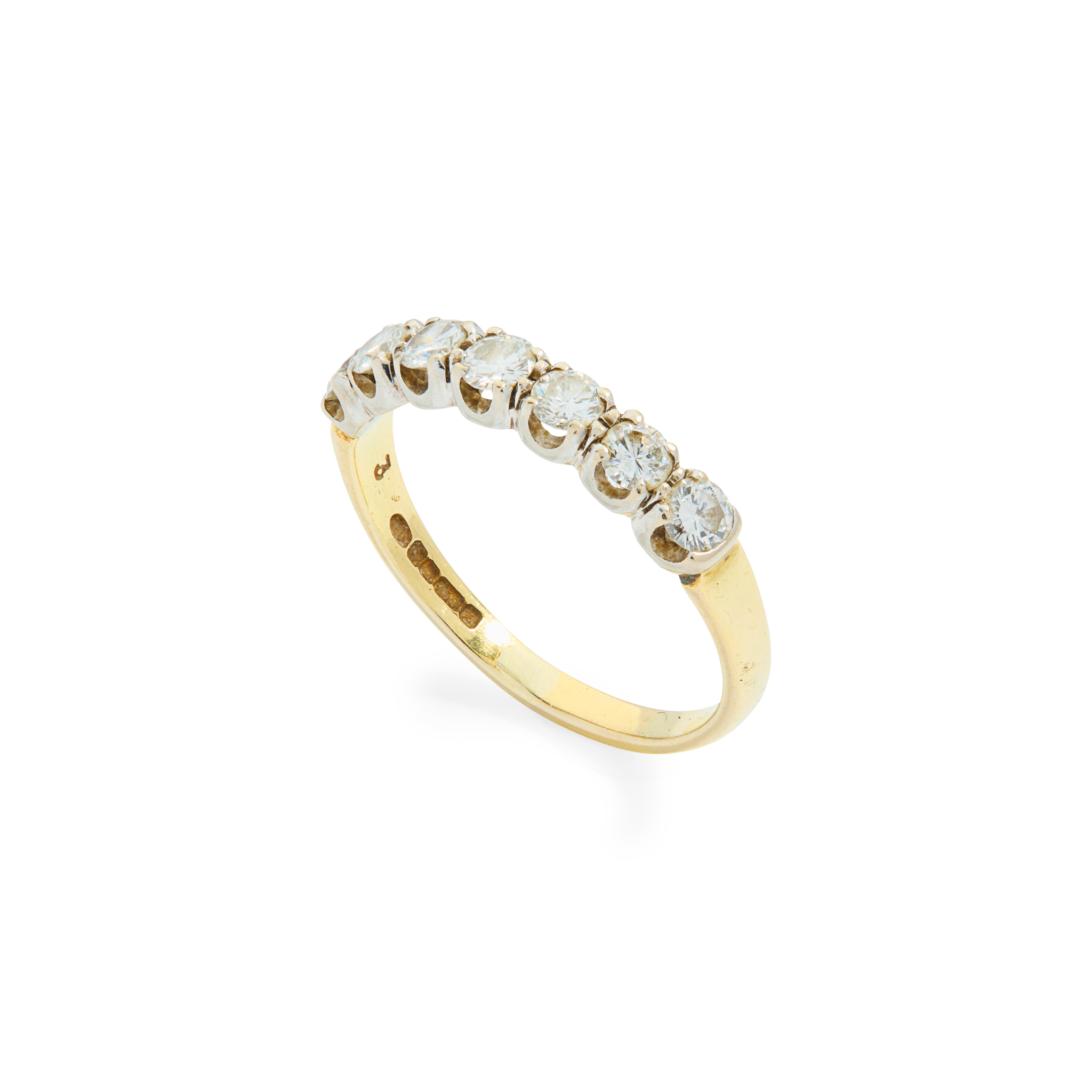 An 18ct gold diamond half-eternity ring