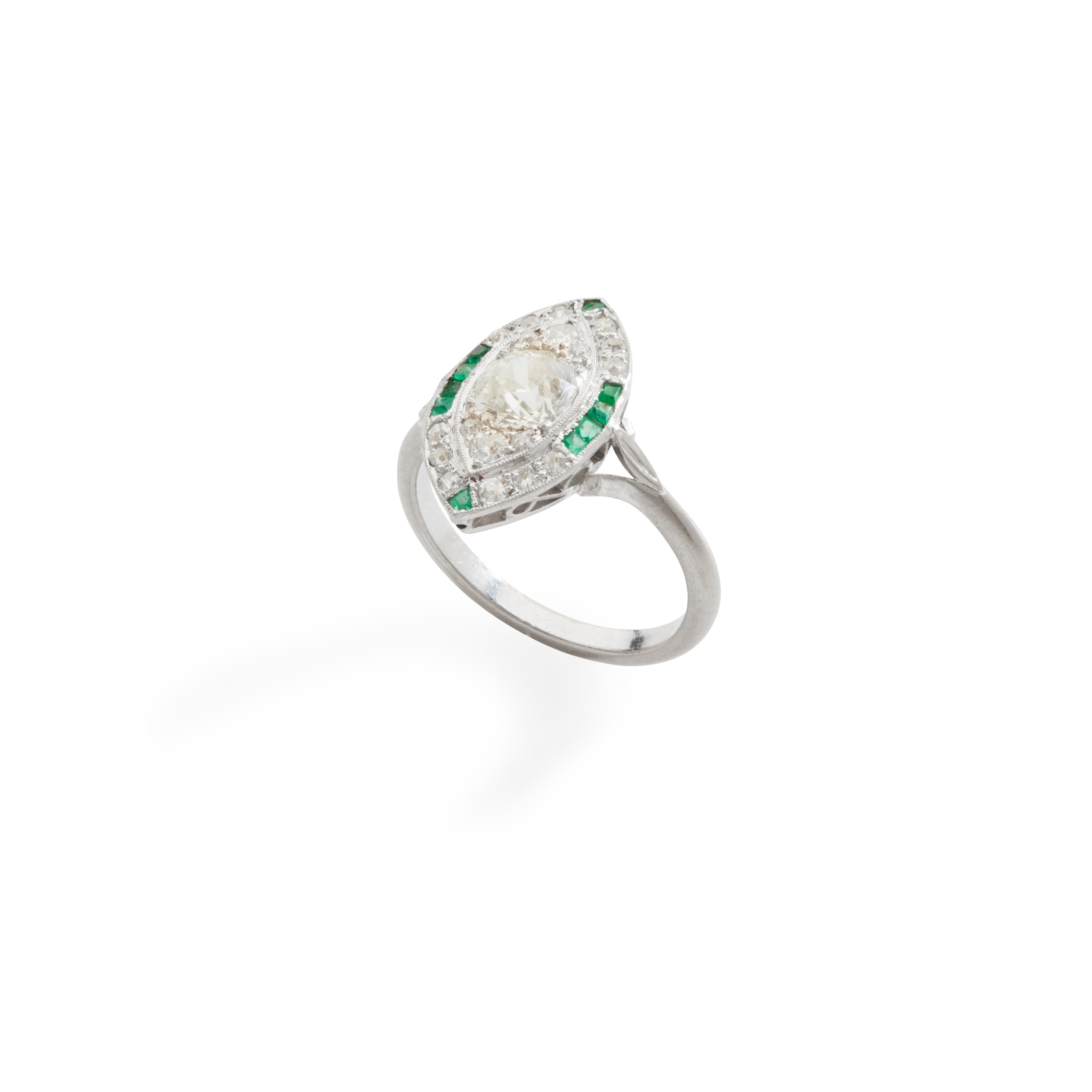 An emerald and diamond dress ring
