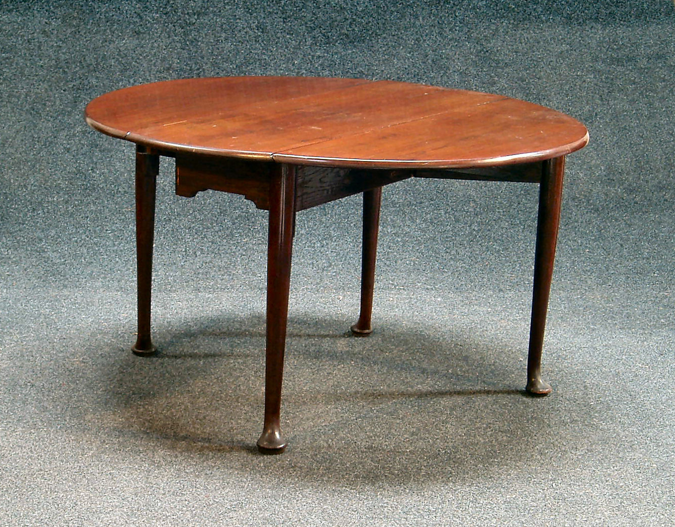 A Georgian mahogany drop flap supper table,