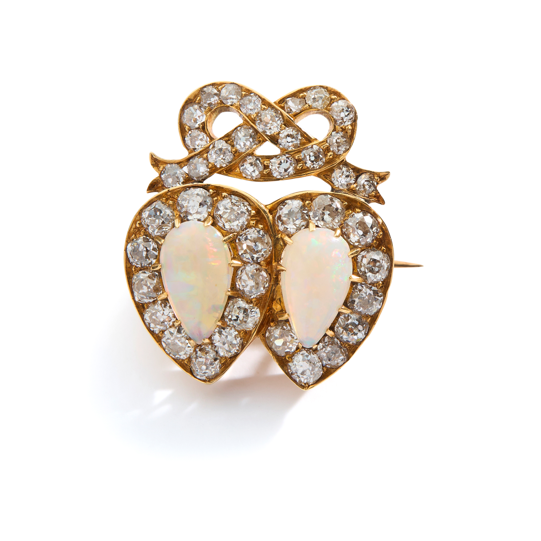 AN EARLY 20TH CENTURY OPAL AND DIAMOND LUCKENBOOTH BROOCH
