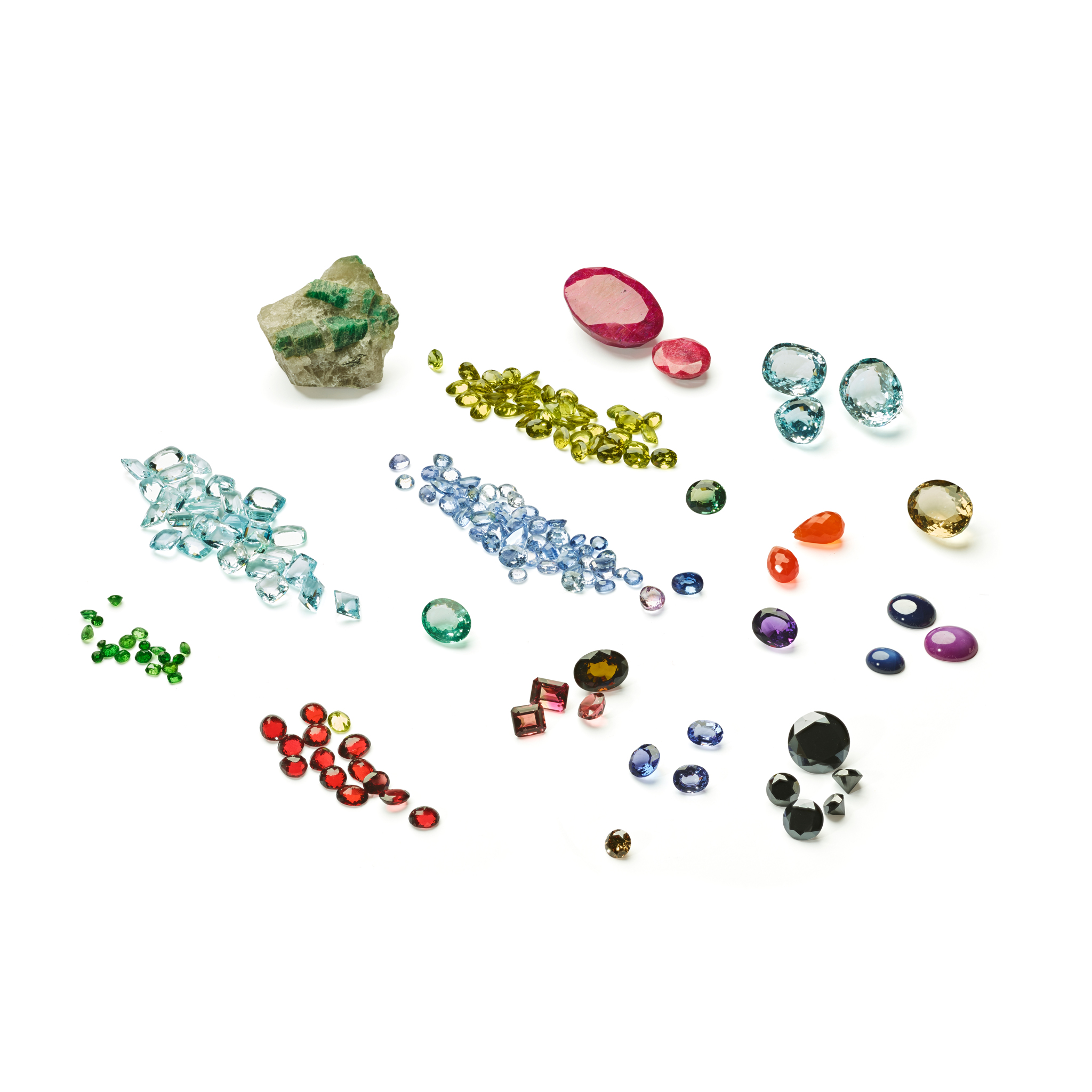 A collection of unmounted gemstones