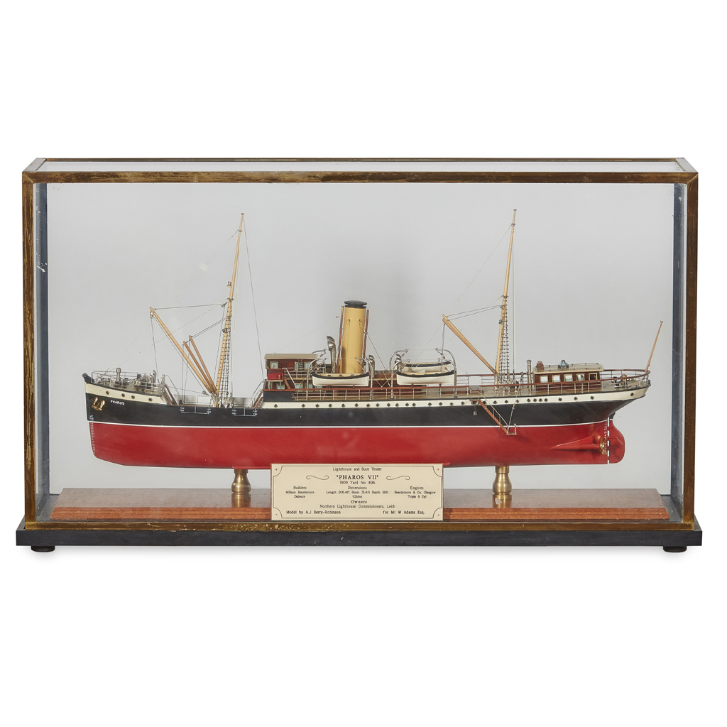 A CASED MODEL OF A LIGHTHOUSE AND BUOY TENDER