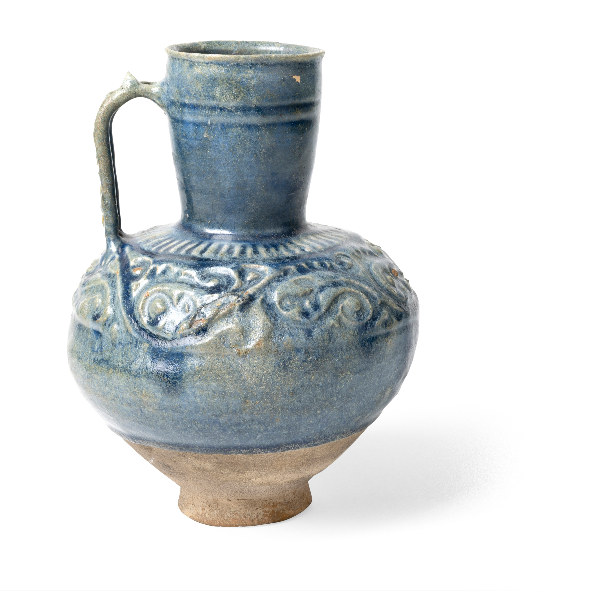 A STRIKING KASHAN MONOCHROME MOULDED POTTERY JUG