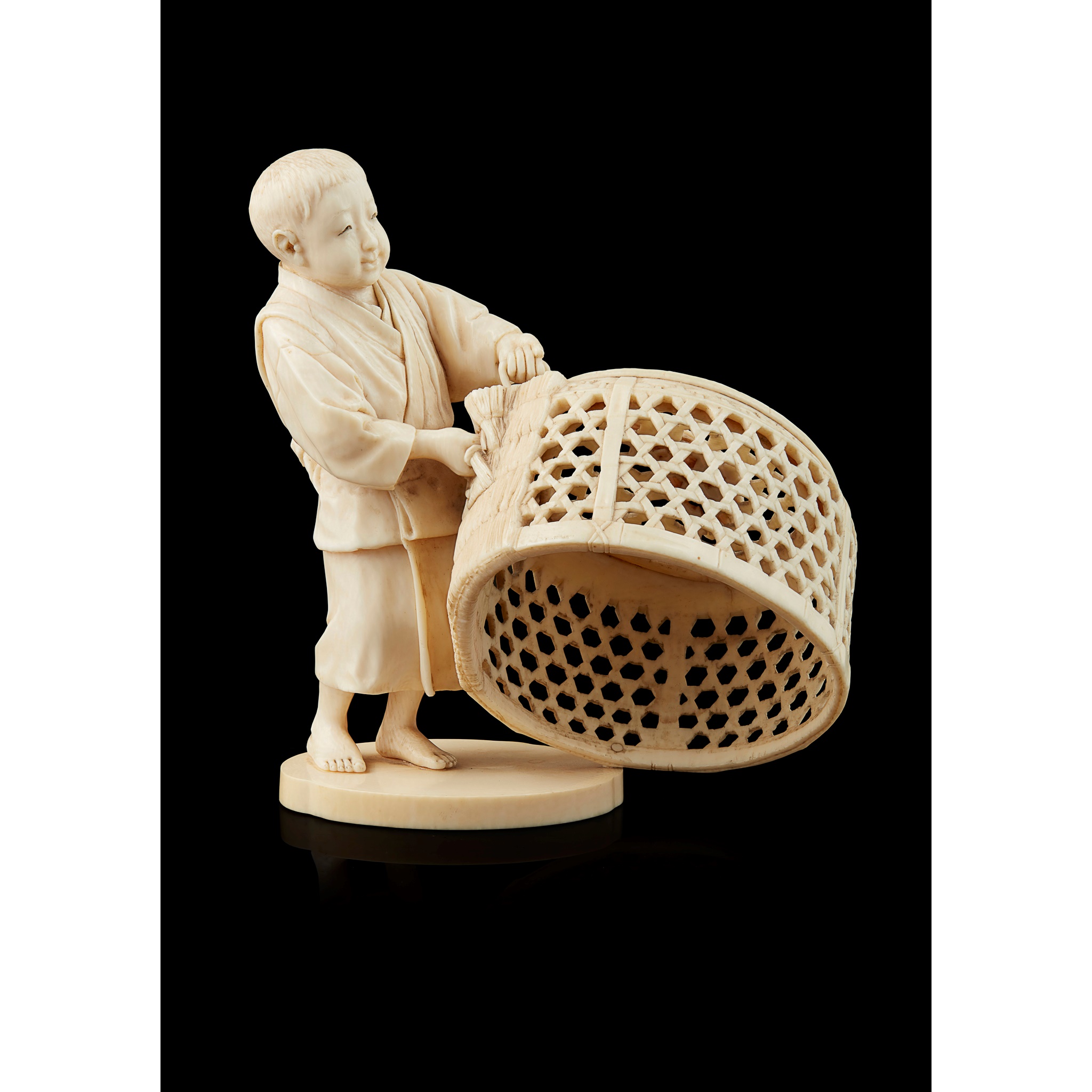 JAPANESE IVORY OKIMONO OF A FISHER BOY