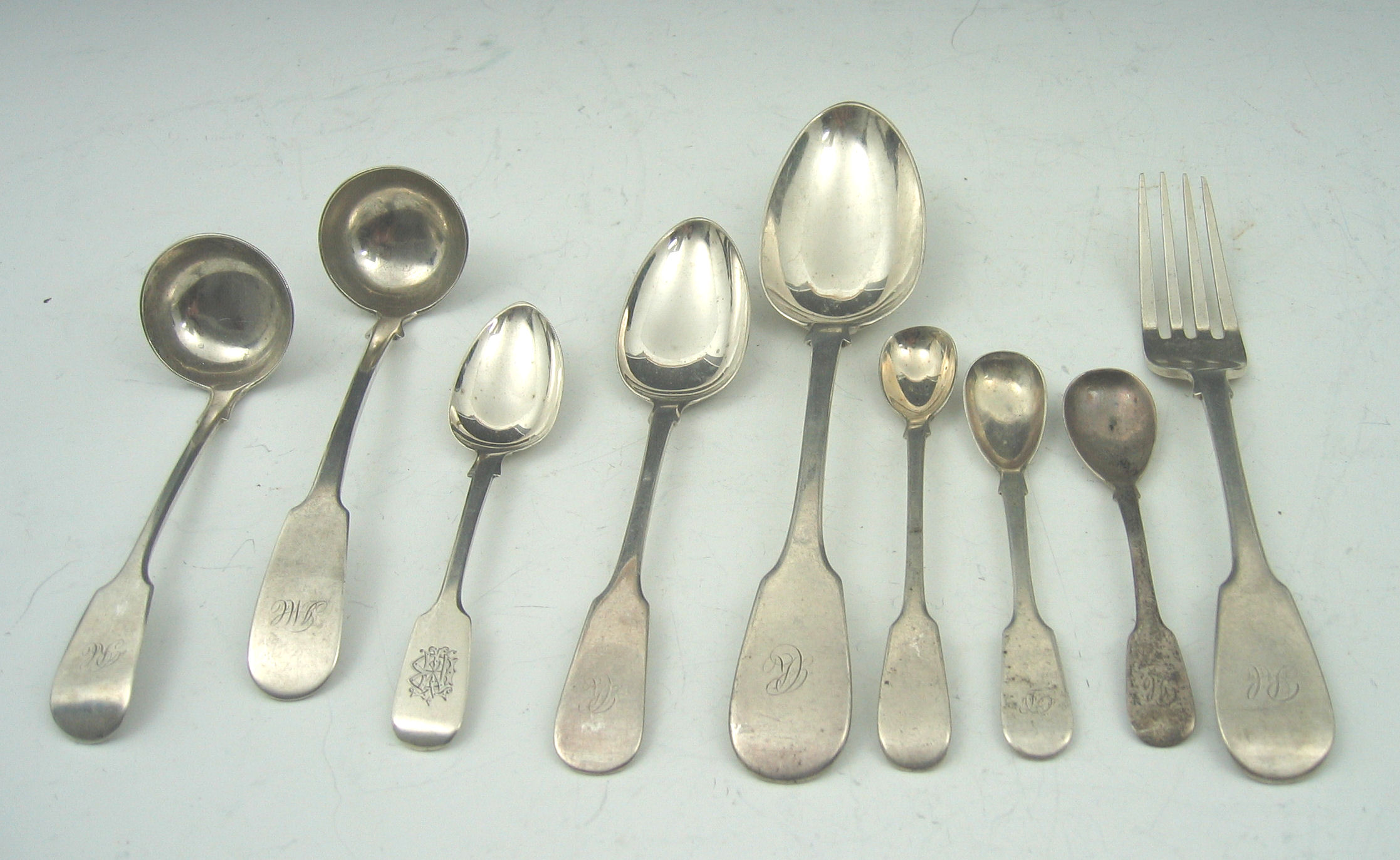 A collection of 19th century Fiddle pattern flatware,