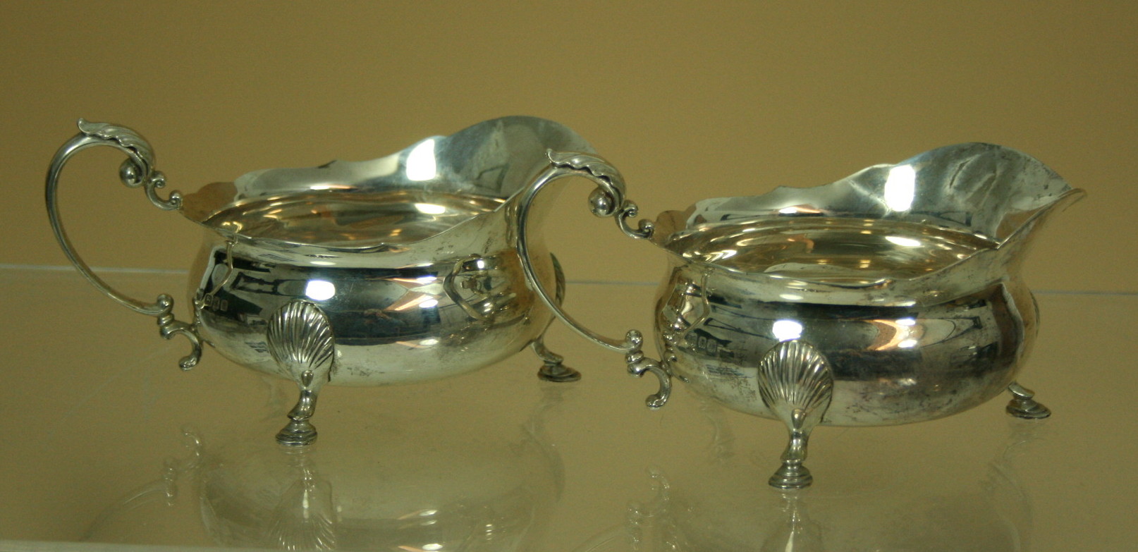 A pair of silver sauce boats