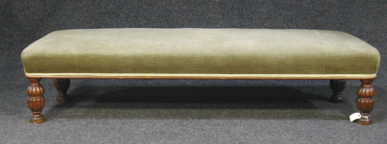 A Victorian upholstered and oak window seat,