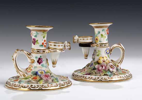 A pair of mid-19th century Staffordshire chamber sticks and snuffers