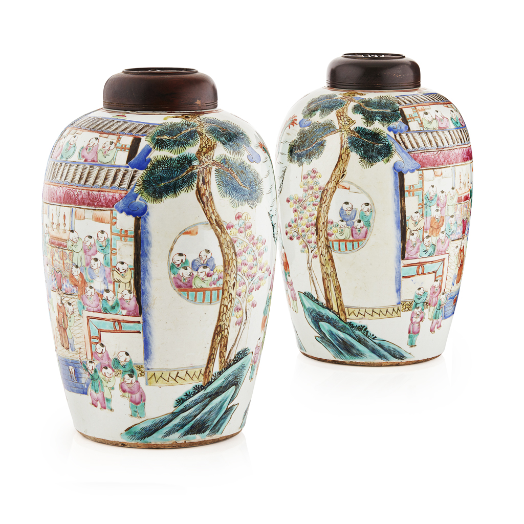 PAIR OF FAMILLE ROSE 'HUNDRED BOYS' JARS AND HARDWOOD COVERS