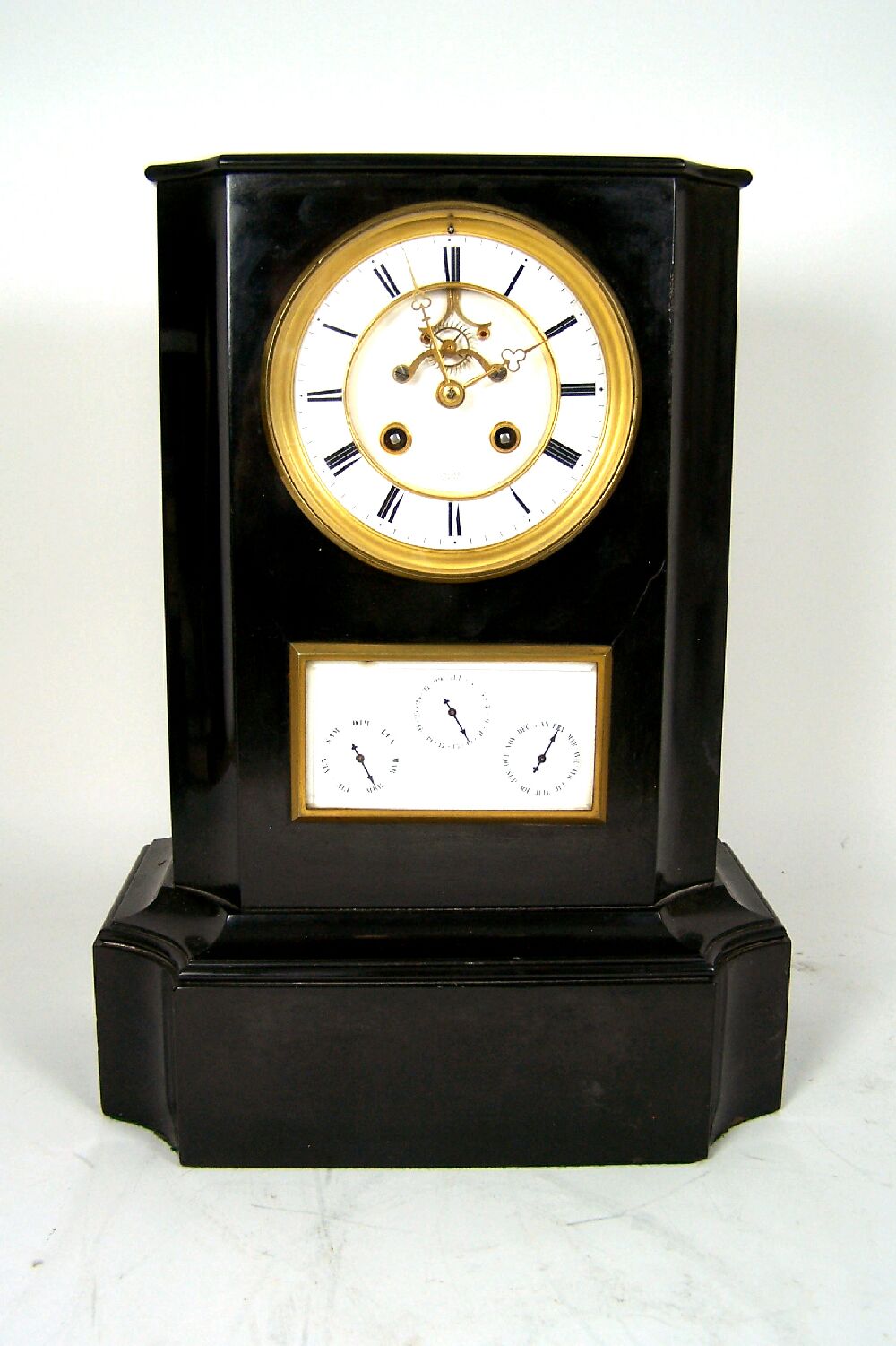 A French slate calendar clock By Moser, Paris