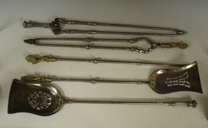 A set of 19th century brass and steel fire irons