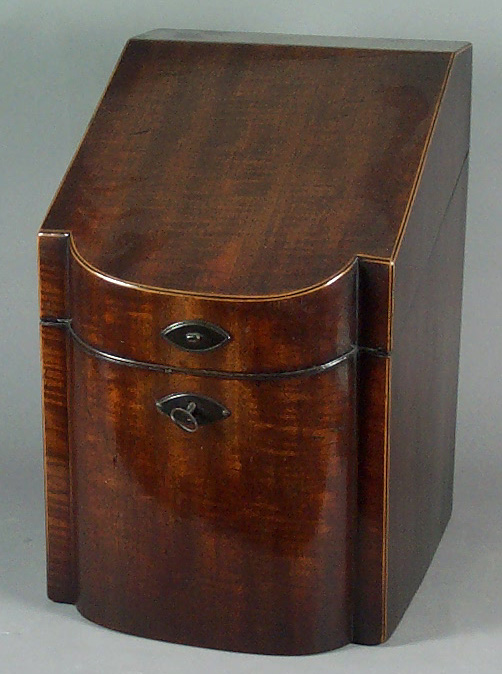 A pair of early 19th century mahogany knife boxes