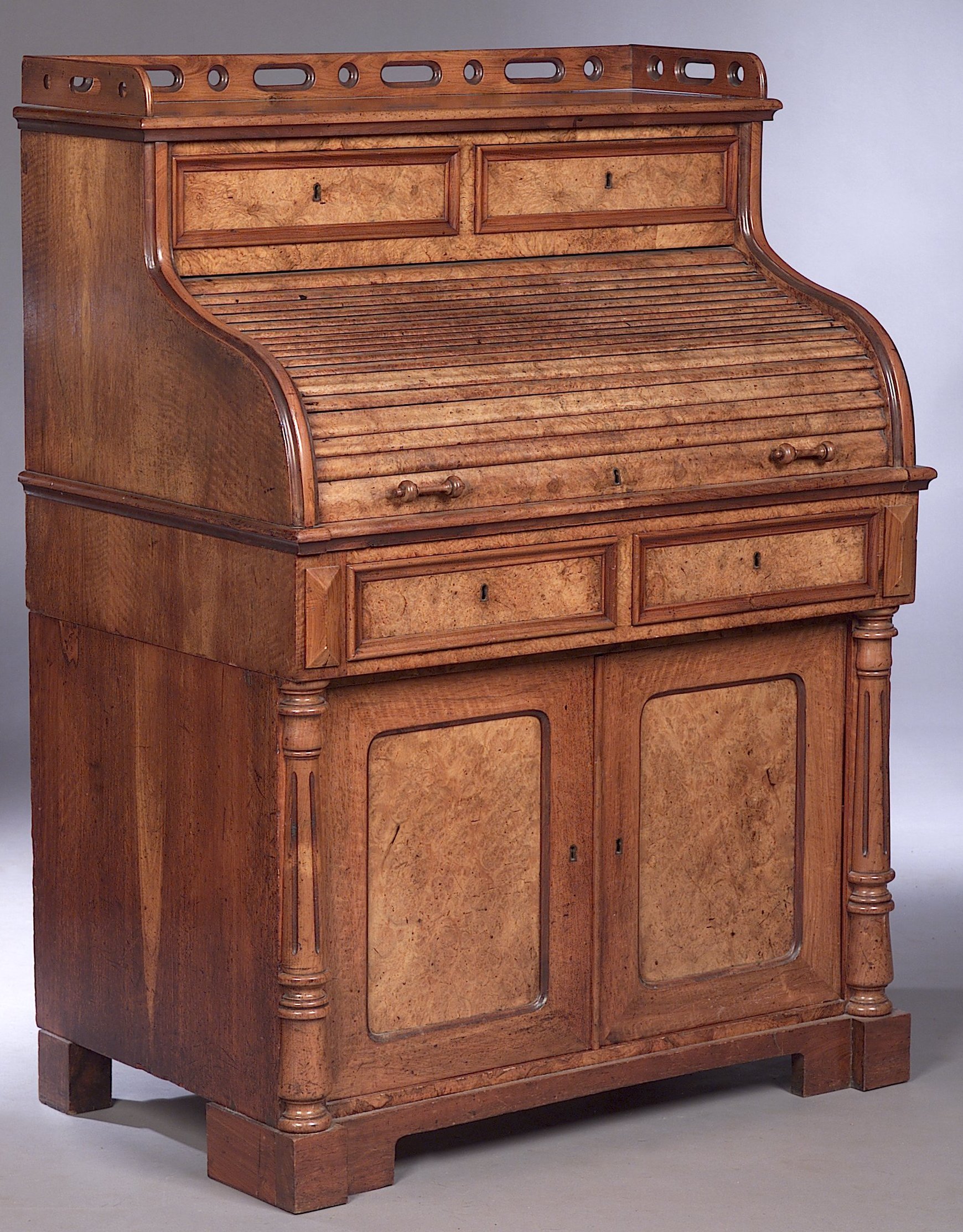 A Victorian burr walnut tambour bureau