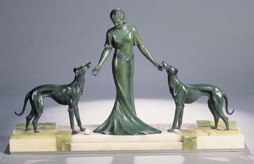 An Art Deco patinated bronze figure group