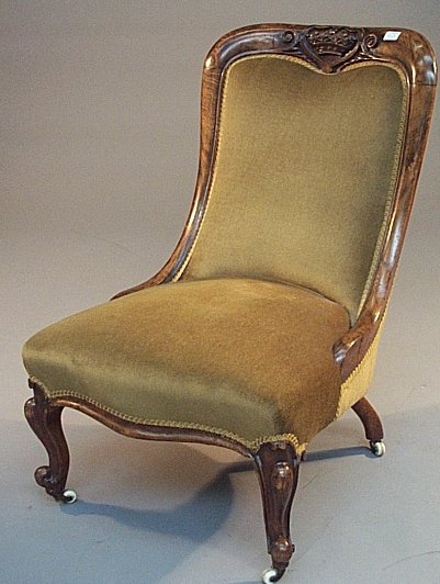 A Victorian mahogany framed low open armchair