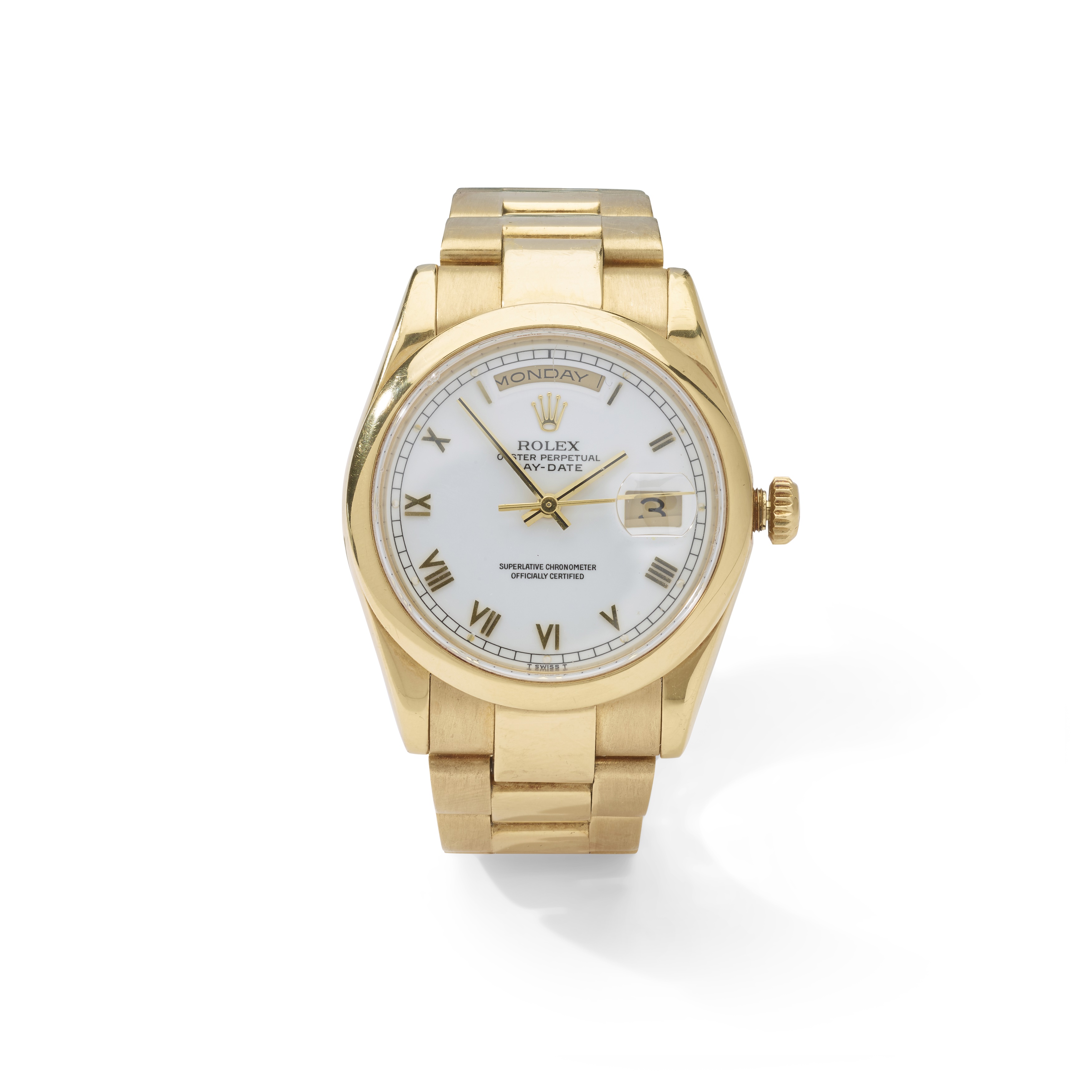 Rolex: A gold wristwatch