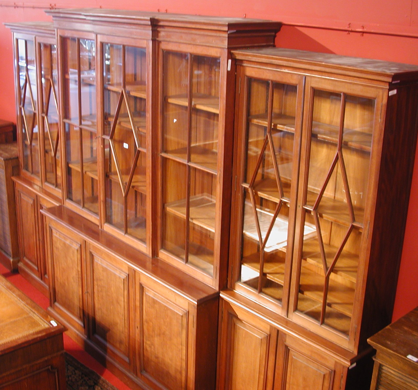 AN EDWARDIAN mahogany DOUBLE breakfront bookcase,