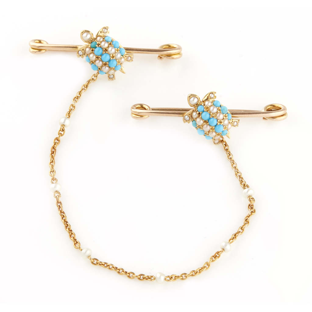 An early 20th century double turtle pin