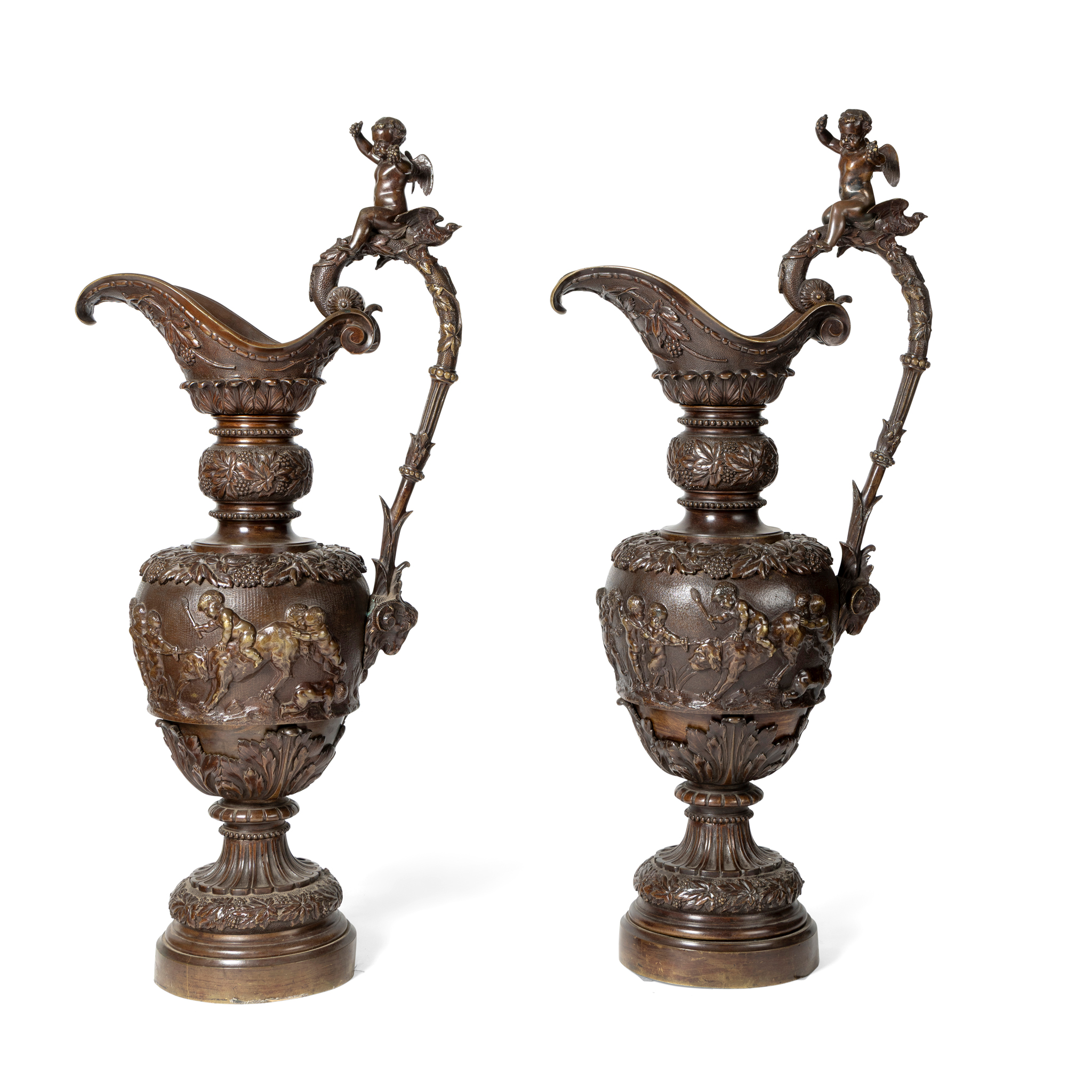 A PAIR OF BRONZE EWERS OF OVERSIZE PROPORTIONS