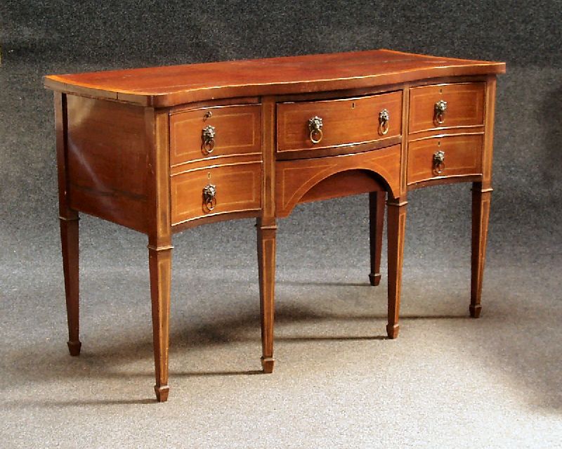 A 19th century mahogany serpentine sideboard