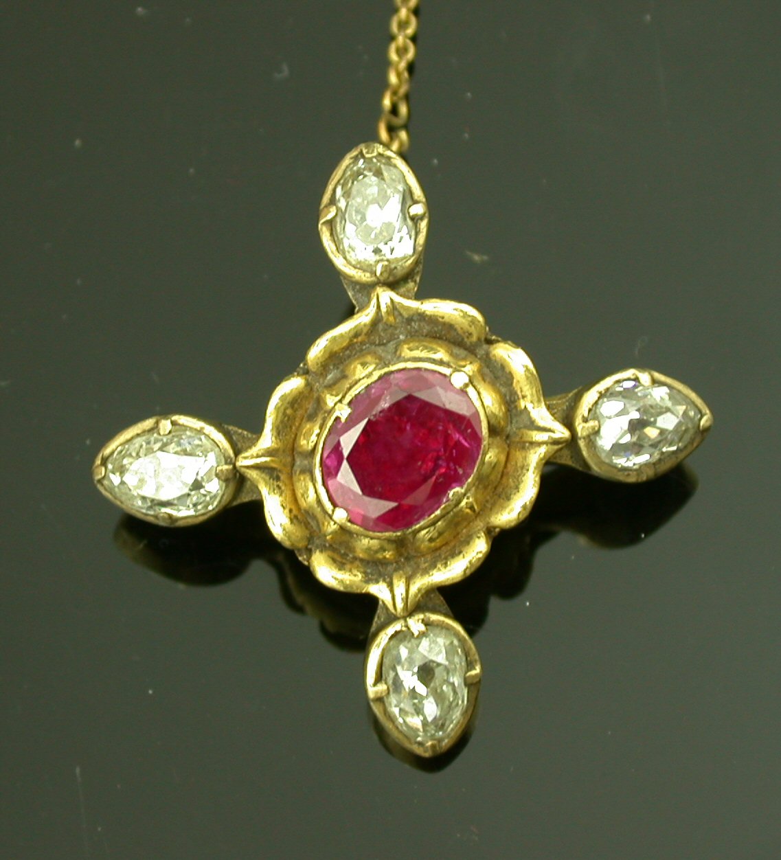 An antique ruby and diamond brooch,
