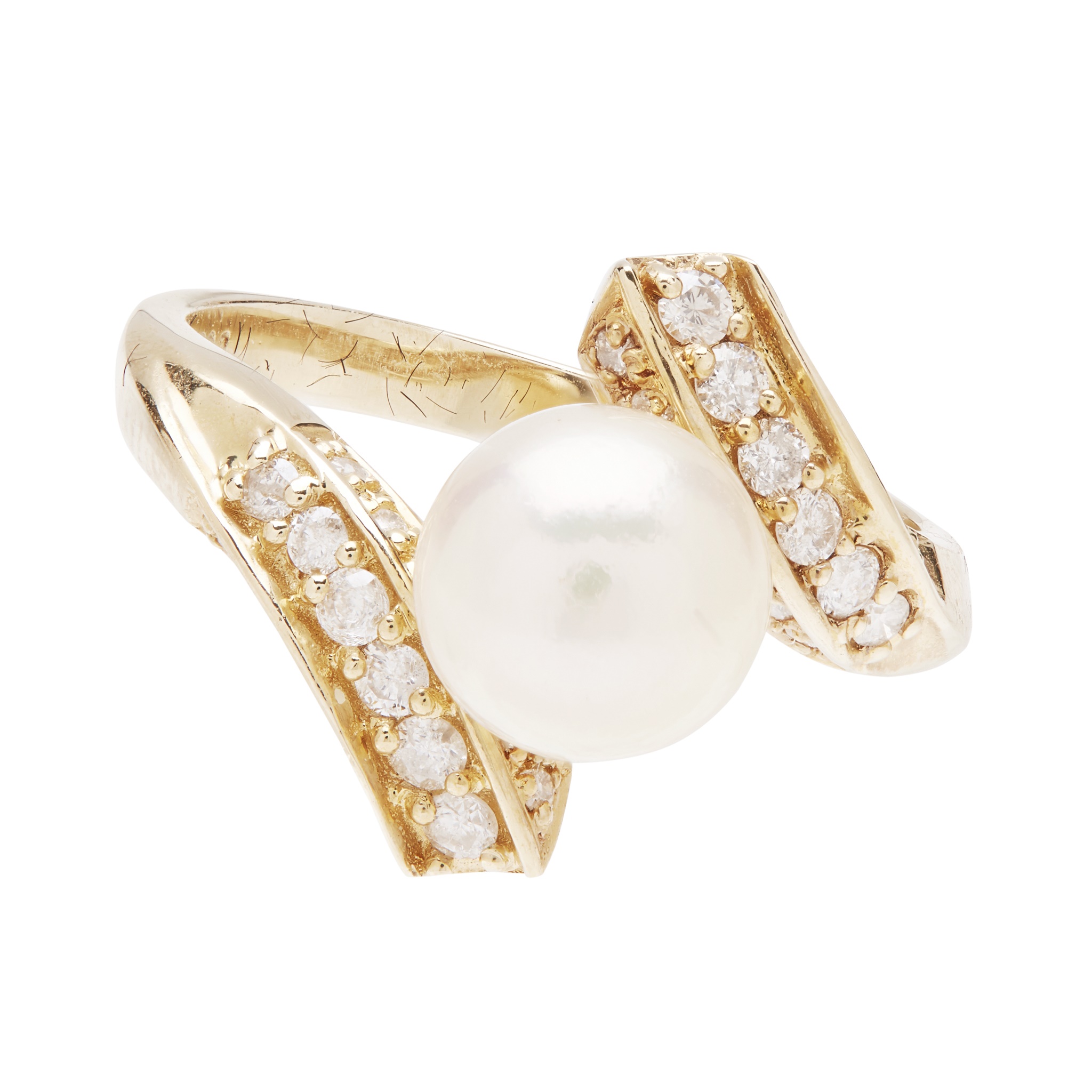 A pearl and diamond set ring