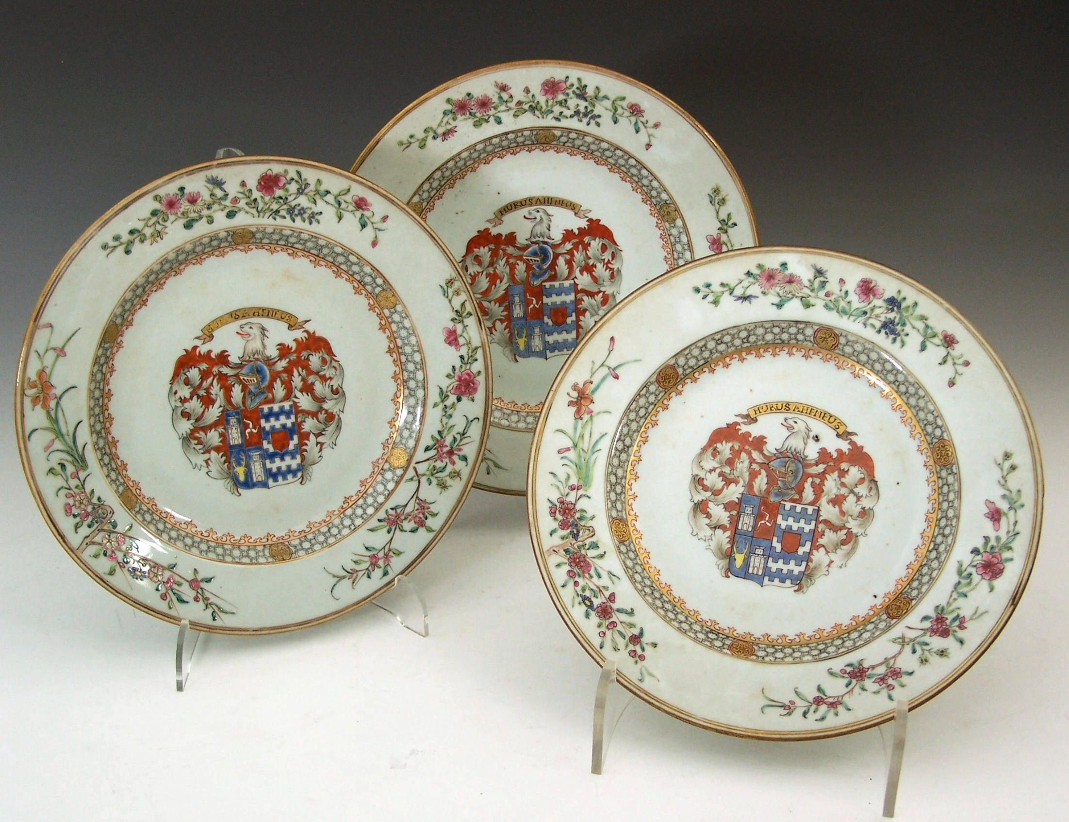 A set of twelve Chinese export Armorial plates, circa 1733,
