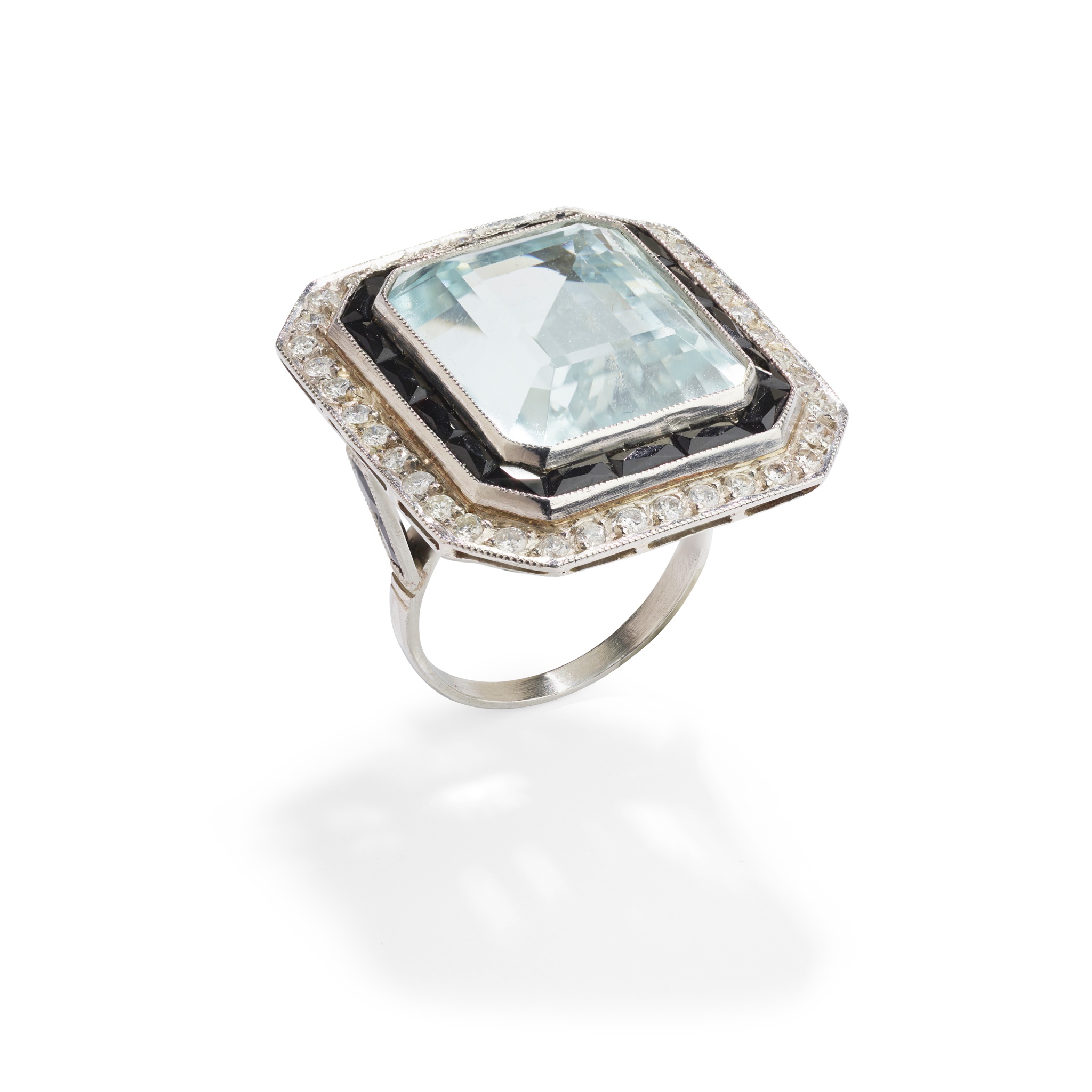 An aquamarine, onyx and diamond cocktail ring